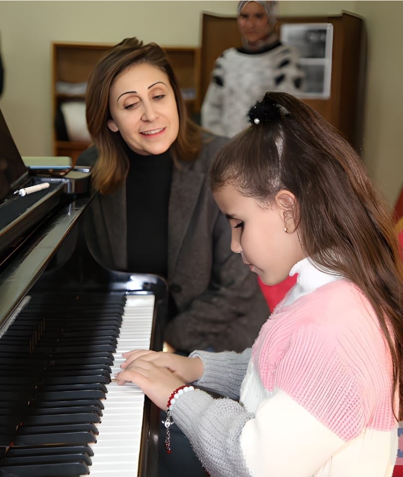 Dr. Nevine El Kilany Attends Talia’s First Piano Lesson